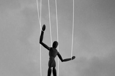 2 men playing basketball in grayscale photography